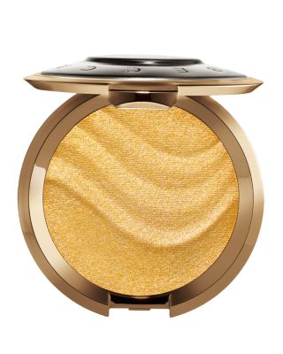 Becca Cosmetics - 40% off Becca Cosmetics Shimmering Skin Perfector Pressed Highlighter in Gold Lava with any cosmetics purchase!