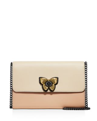 coach butterfly clutch