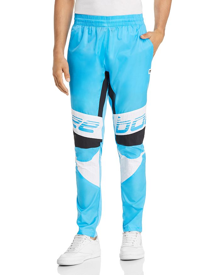 Reebok Classic Color block Track Pants In Bright Cyan ModeSens