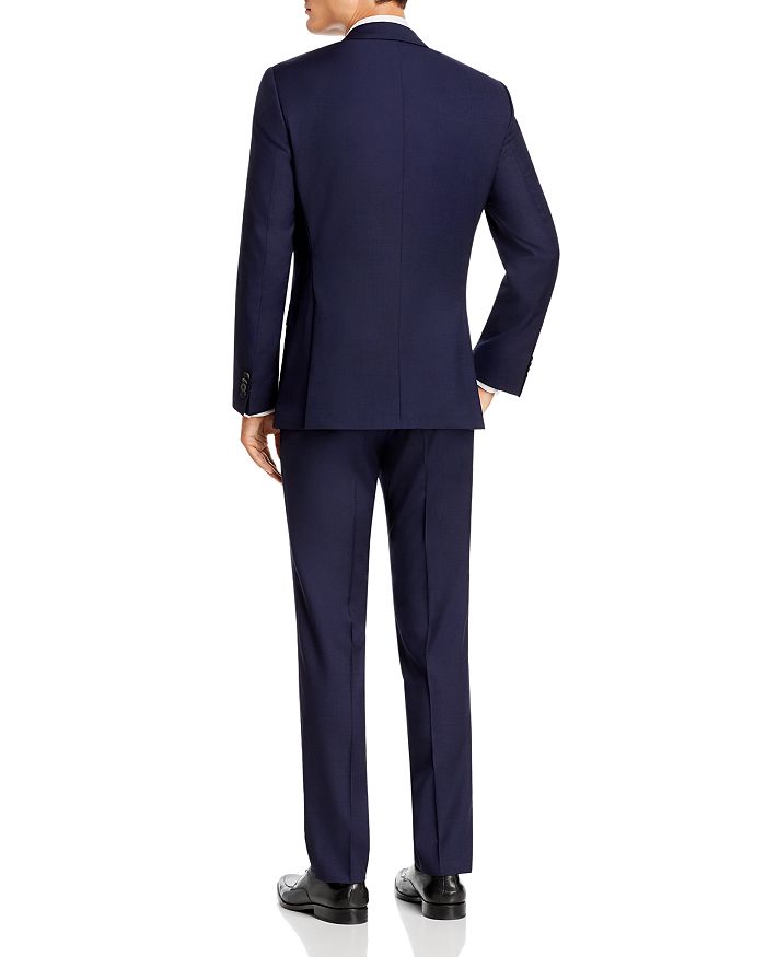 Shop Hugo Boss Huge/genius Solid Slim Fit Suit In Navy