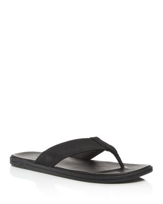 black leather flip flops