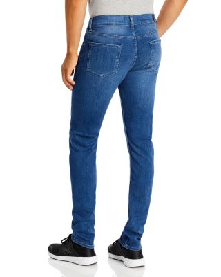 Luxe Performance Plus Slimmy Tapered Slim Fit Jeans in Mid Blue