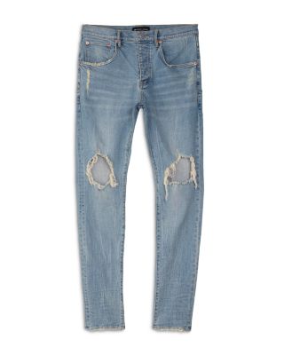 Dropped Slim Fit Destroyed Jeans in Light Indigo