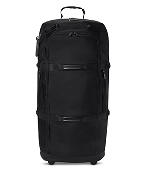 Shop Tumi Collapsible Wheeled Duffel Bag In Black