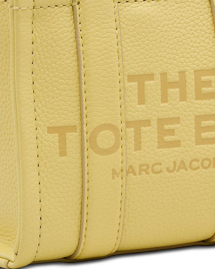Shop Marc Jacobs The Leather Mini Tote In Custard/nickel