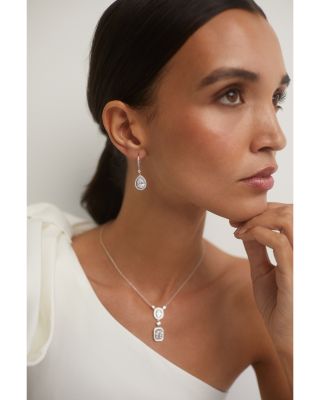 Radiant Pear Shape Cubic Zirconia Halo Drop Earrings in Rhodium Plated