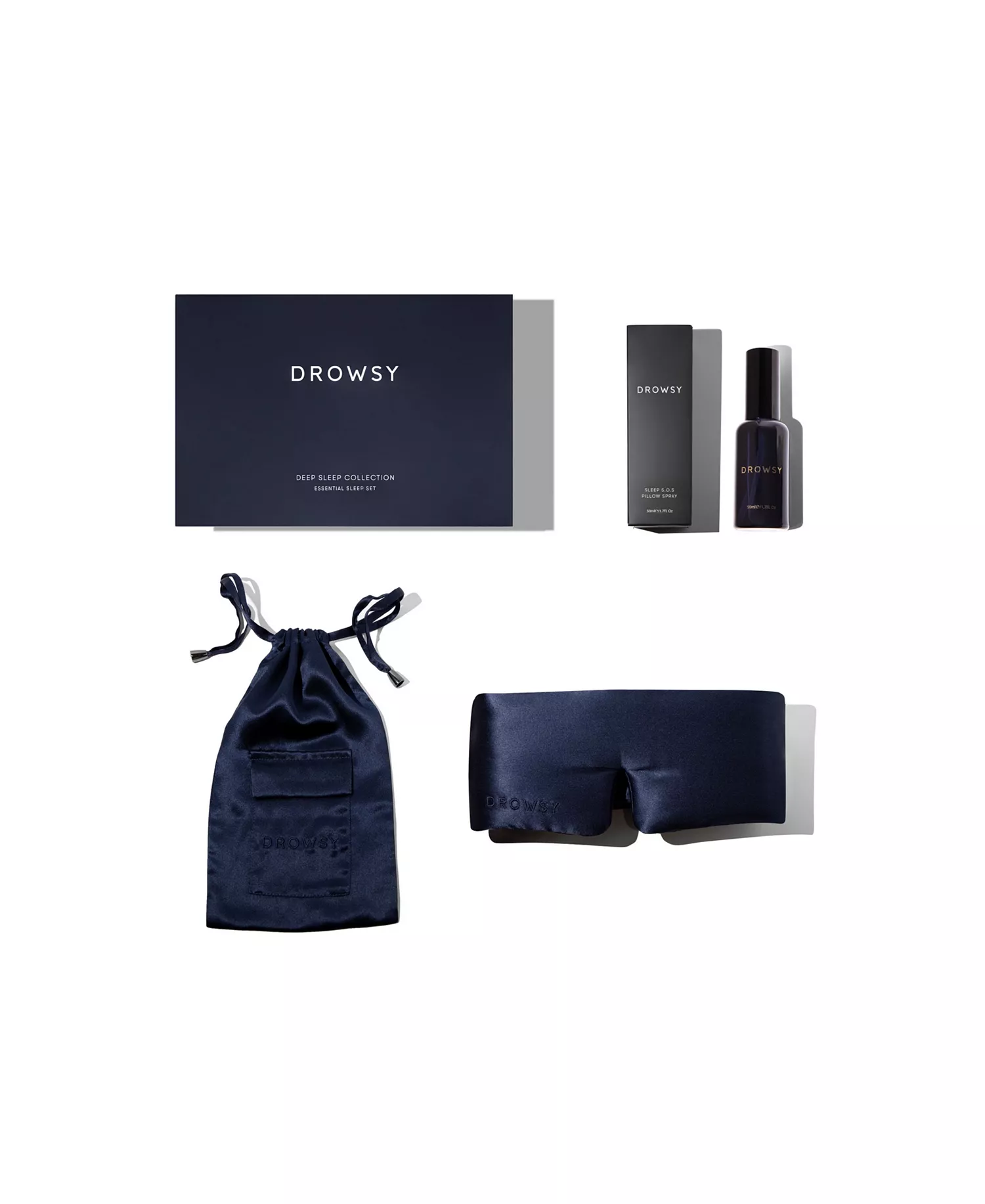 Drowsy Deep Sleep Collection in dark blue with padded silk sleep mask, matching pouch, and pillow spray