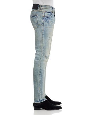 Worn Slashed Paint Jeans in Light Indigo