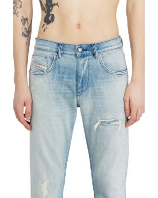 D-Strukt Slim Fit Distressed Jeans in Denim