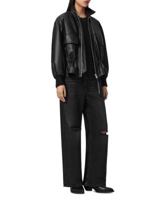 Aki Mid Rise Crossover Jeans in Destroy Black