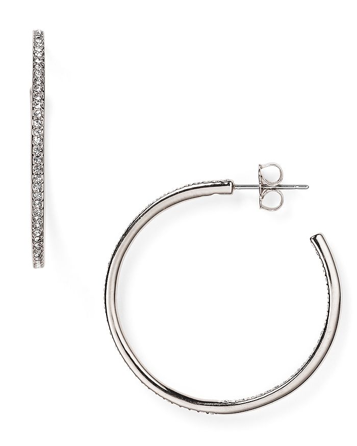 Shop Nadri Pave Hoop Earrings In Silver