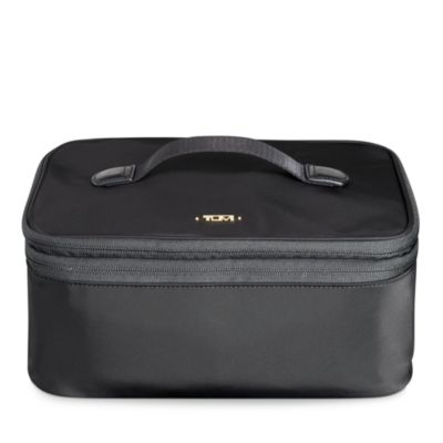 tumi train case