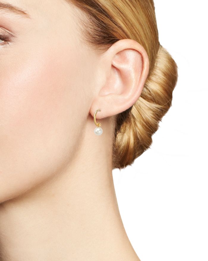Shop Bloomingdale's Cultured Freshwater Pearl Huggie Hoop Earrings In 14k Yellow Gold, 6mm - 100% Exclusive In White/gold