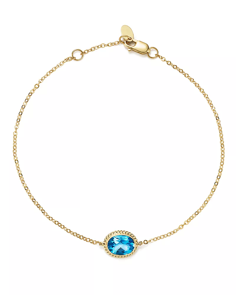 Blue Topaz Oval Bracelet in 14K Yellow Gold