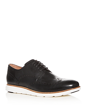 Shop Cole Haan Men's Original Grand Leather Wingtip Oxfords In Black/white