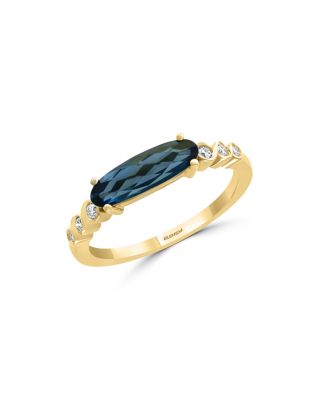 london blue topaz and diamond ring in 14k yellow gold