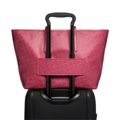 tumi pink luggage