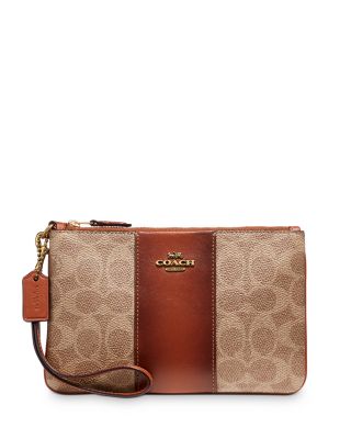 mini alie bolsa charm in signature canvas