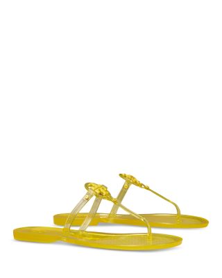mustard colored flip flops