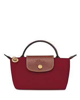 Clutch bag Longchamp Red in Synthetic - 31038320