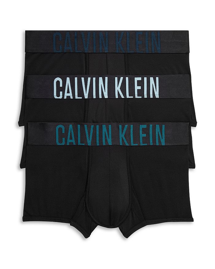 Shop Calvin Klein Intense Power Low Rise Trunks, Pack Of 3 In Black W/ Atlantic Deep/blueberry/aquatic Logos