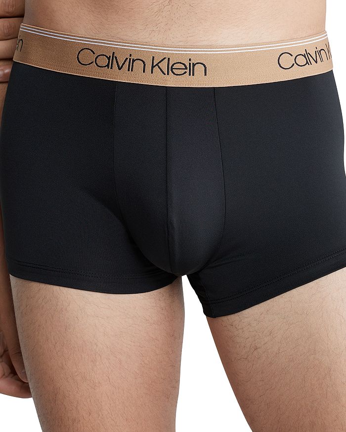 Shop Calvin Klein Microfiber Stretch Wicking Low Rise Trunks, Pack Of 3 In Black W/ Black/tigers Eye/lunar Rock Wbs