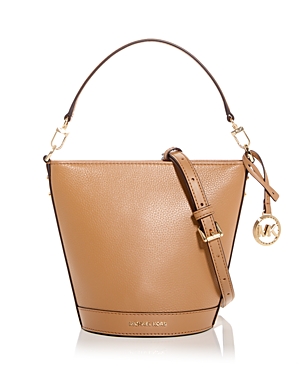 Shop Michael Kors Townsend Small Leather Convertible Bucket Crossbody In Pale Peanut
