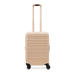 Shop Beis The Glossy Carry On Roller Suitcase In Beige