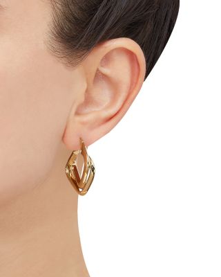Polished Crossover Tube Hoop Earrings in 14K Yellow Gold