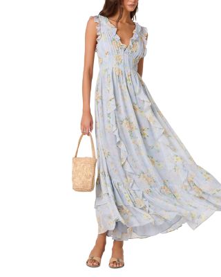 white flowy dress nearby Orange Floral Flowy Dress · Filly Flair main image 1