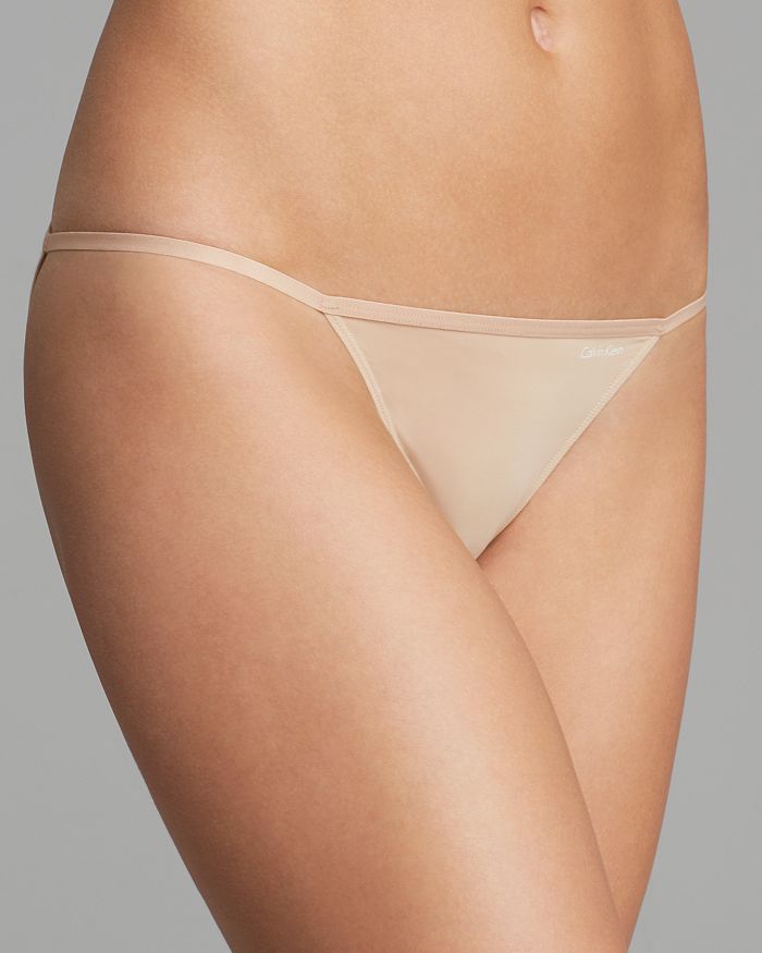 Shop Calvin Klein Underwear Sleek String Bikini In Bare