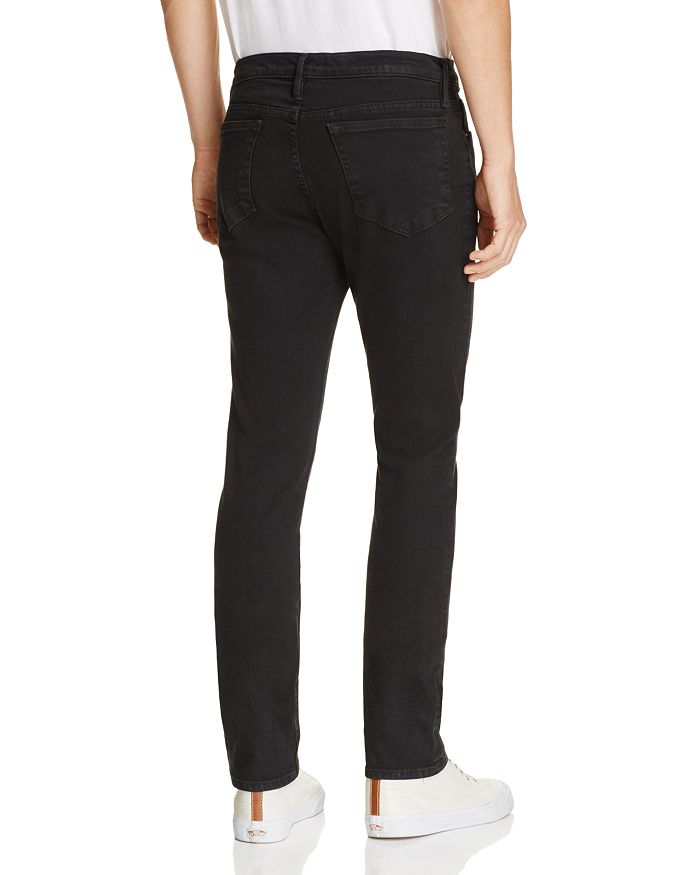 Shop Frame L'homme Skinny Fit Jeans In Noir