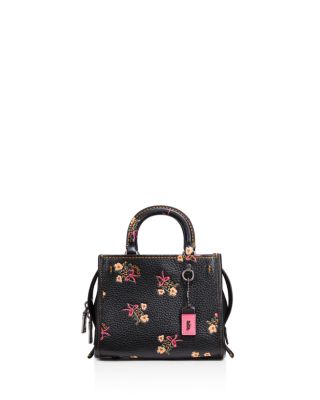 coach rogue floral bow