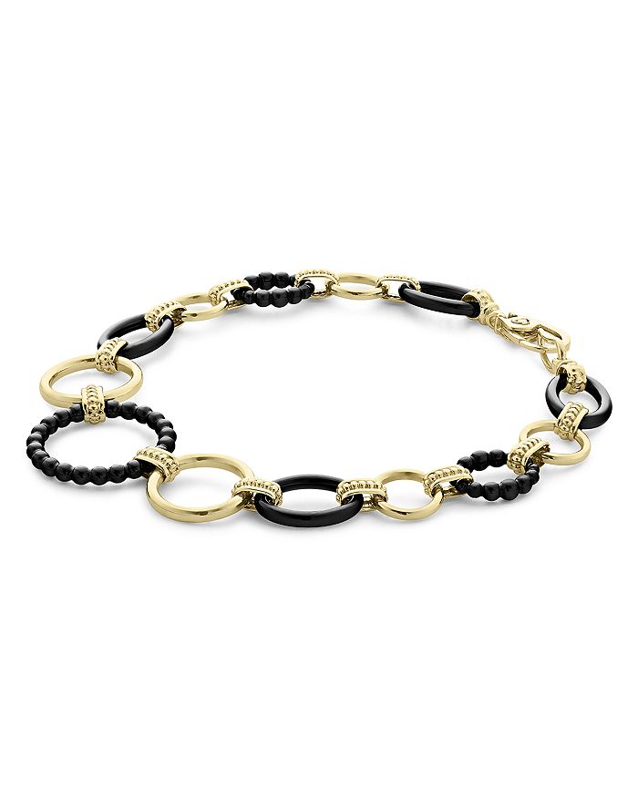 Shop Lagos Meridian 18k Yellow Gold Gold & Black Caviar Black Ceramic Circle Link Bracelet In Black/gold