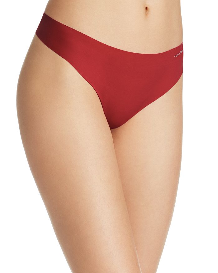 Calvin Klein Invisibles Thong In Raspberry Jam