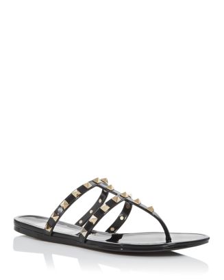 【VALENTINO】ROCKSTUD PVC SANDAL Valentino Garavani Rockstud PVC Flat Thong Sandals | Neiman