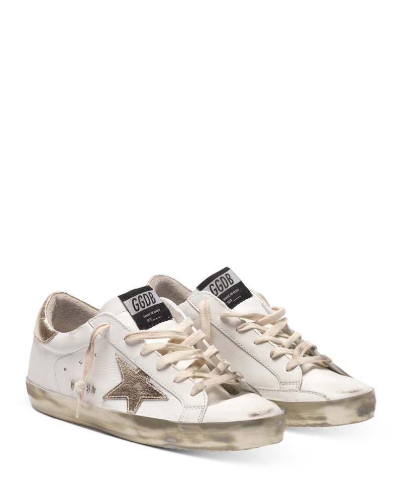 Golden Goose Deluxe Brand Women's Super-Star Low Top Sneakers in White/Gold