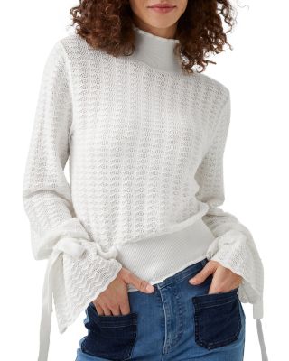 white designer sweater