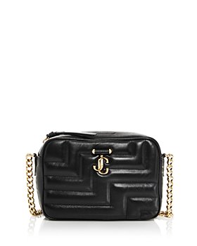 Jimmy Choo Logo Charm Quilted Vanity Case - ShopStyle Makeup & Travel Bags