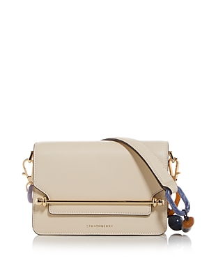 Shop Strathberry East West Bead Strap Leather Mini Shoulder Bag In Vanilla