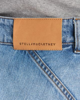 Mid Waist Relaxed Curve Deconstructed Jeans in Mid Blue
