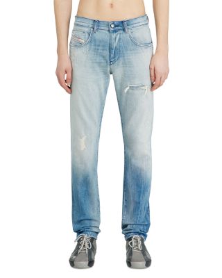 D-Strukt Slim Fit Distressed Jeans in Denim
