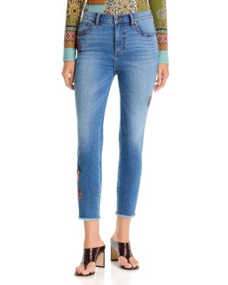 The Cropped Mid Rise Skinny Jeans in Light Wash