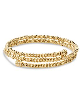 Set of 2 gold coil wrap bracelets