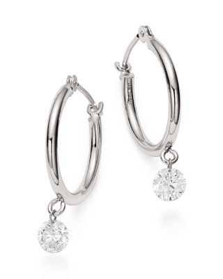 hoop earrings with dangling diamond