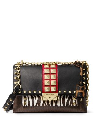 ROCKSTUD E/W HANDBAG IN MIRROR-EFFECT CALFSKIN