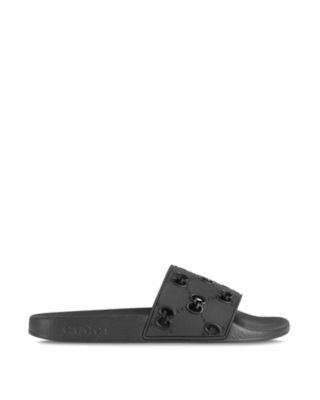 black designer flip flops