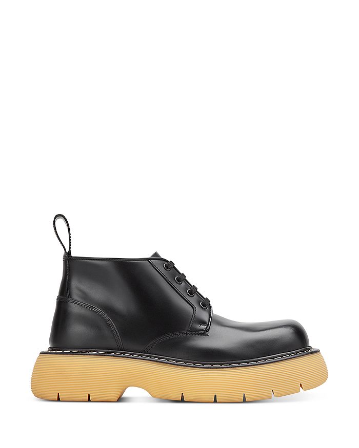 Bottega Veneta The Bounce Leather Ankle Boots In Black