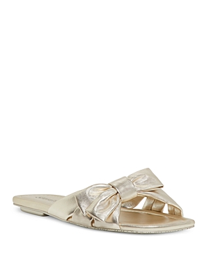Shop Stuart Weitzman Women's Sofia Slip On Bow Slide Sandals In Light Gold