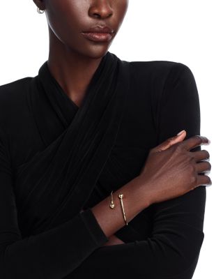 Polished Bead End Bypass Bangle Bracelet in 14K Yellow Gold